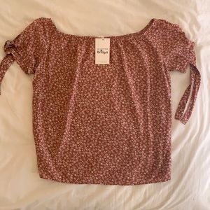 Junior size L (fits as a S/M in Women’s Sizing) blouse